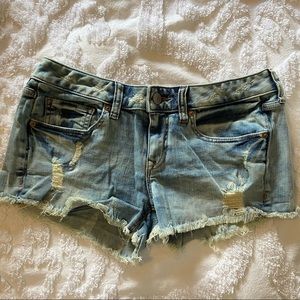 Express medium wash jean shorts